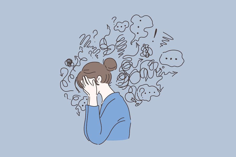 Illustration of a brunette woman in a blue shirt with her head in her hands surrounded by a cloud of squiggly lines