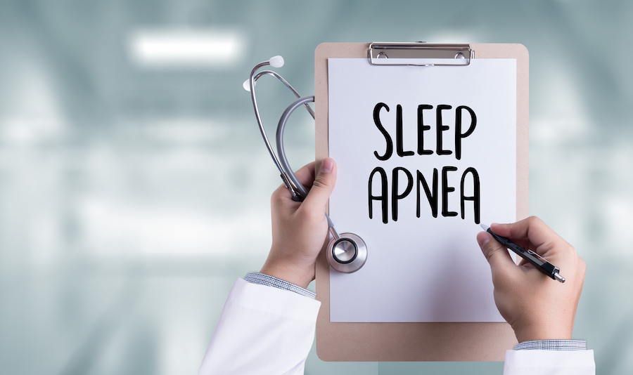 clipboard that says sleep apnea with doctor, suggesting sleep apnea affects health